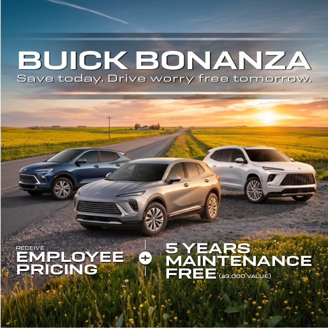 Three Buick SUVs parked on a rural road at sunset, promoting employee pricing and free maintenance offers.